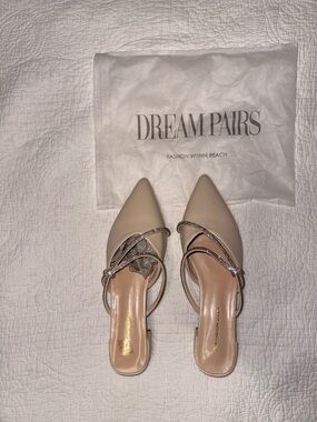 Beige and Rhinestone slip on dress shoes.